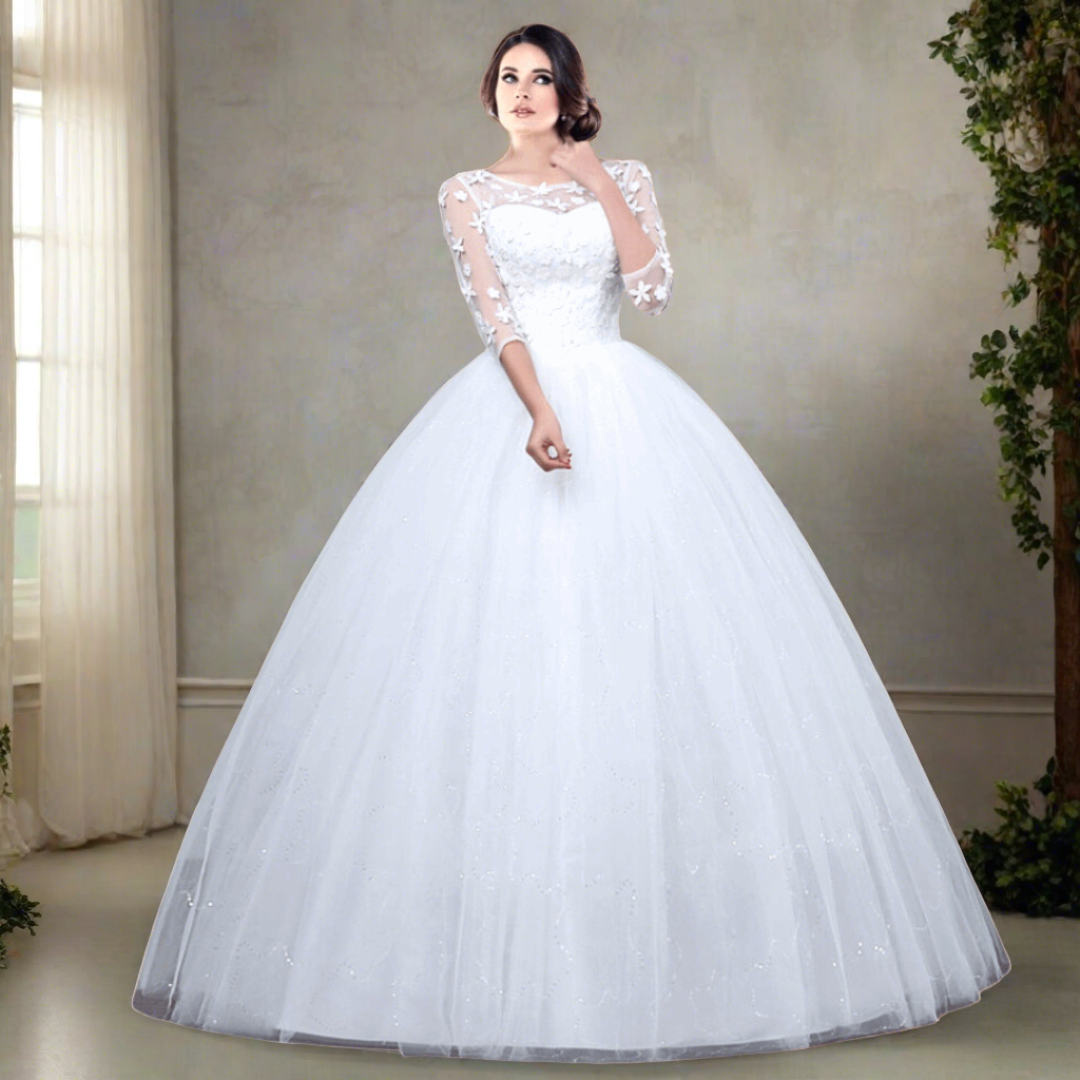Dreamy tulle ball gown adorned with floral appliques.