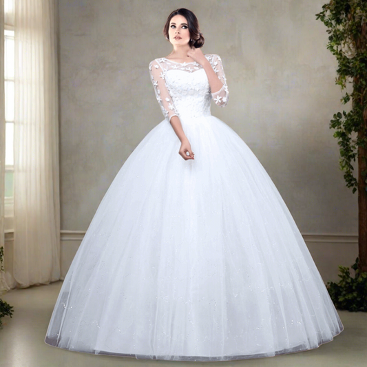 Dreamy tulle ball gown adorned with floral appliques.