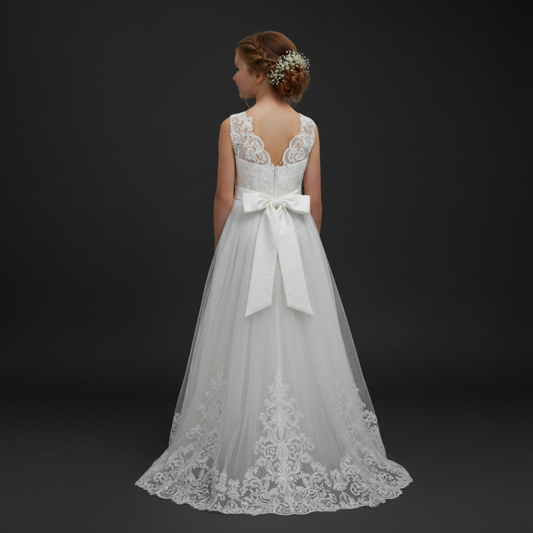 Back view of First Communion Dress showing train and bow — GownLink COLOR