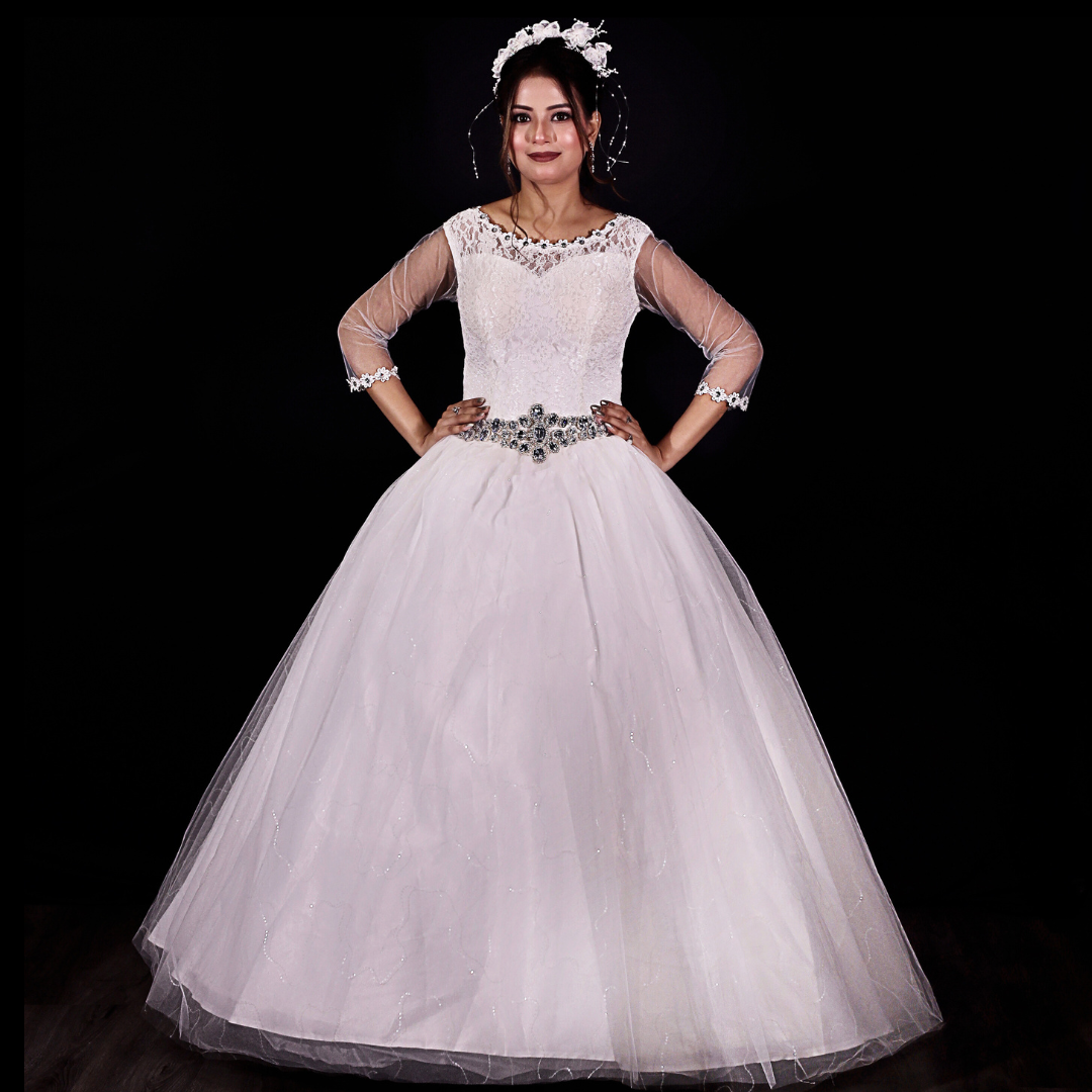 White wedding dress with intricate detailing in Shillong