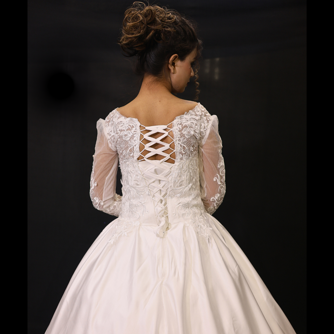 Long sleeve white Catholic bridal dress in Dehradun
