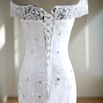 "Heavenly white Mermaid Gown with Sparkling Sequins, Fit for Christian Wedding Opulence"