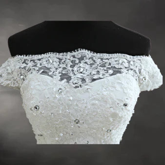 "Enchanting white Mermaid Gown with Beaded Straps, Perfect for Christian Wedding Grace"