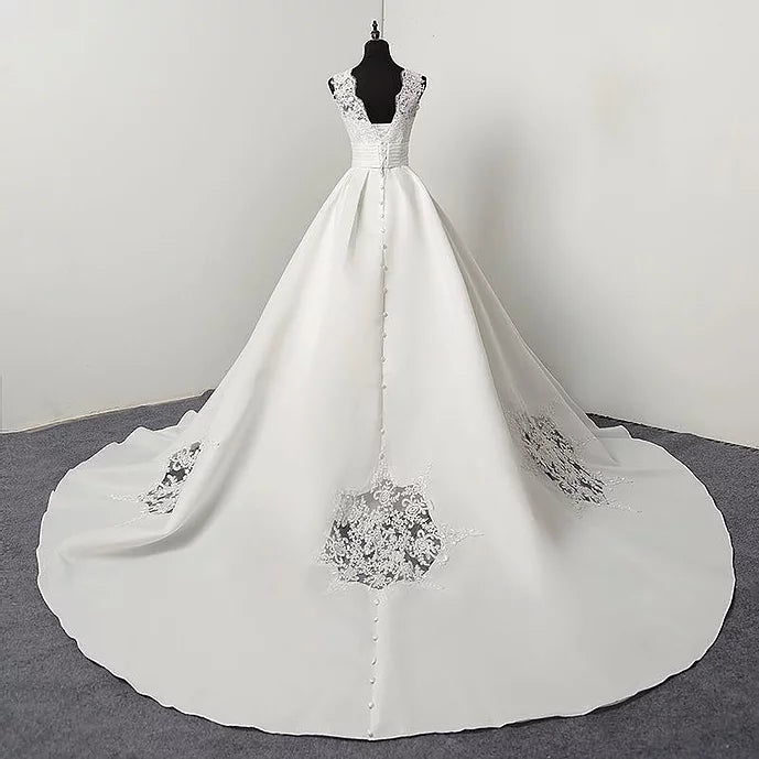 A-line Christian wedding white gown with a sweeping train.