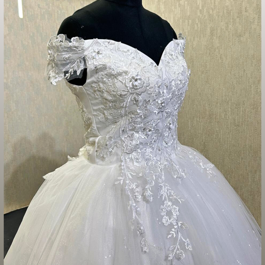 Church setting view of White Princess with Off Shoulder — GownLink GLGF071T