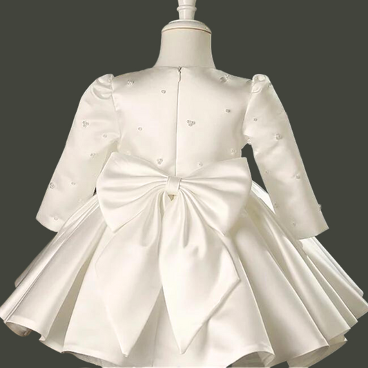 Back view of First Communion Dress showing train and bow — GownLink GLBP7
