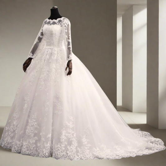 White lace Christian bridal gown featuring sheer long sleeves and a full princess skirt