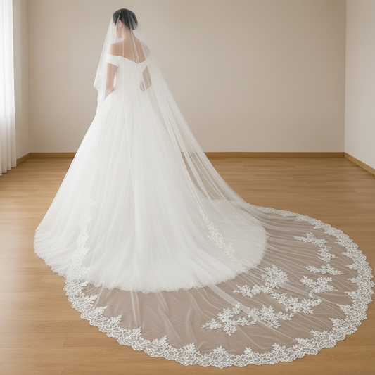 Premium Christian wedding veil in white tulle with floral lace appliques.
Cathedral Christian wedding veil with delicate lace embroidery.