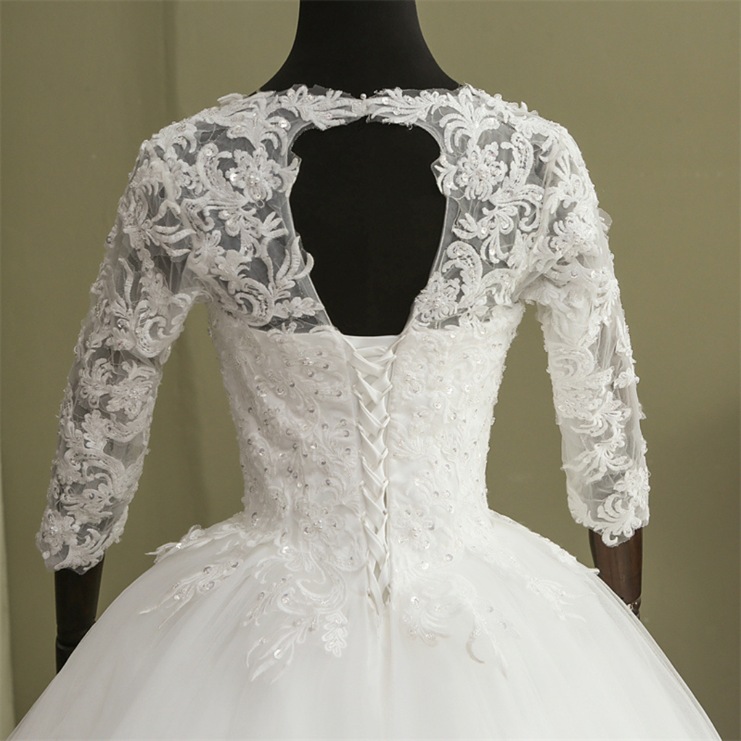 Princess-style Christian wedding dress with lace embroidery, full skirt, and timeless bridal elegance
