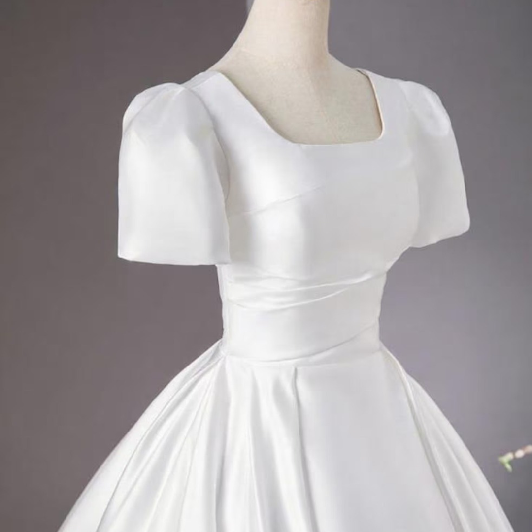 Detail of neckline and bodice on White Bridal Gown Satin with Train — GownLink GLHMST8