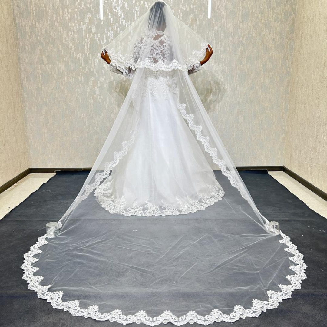 Front view of Long Bridal Veil draped over model — GownLink GLVHM6