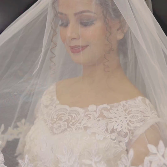 Elegant Roman white wedding veil with lace trim in Shillong