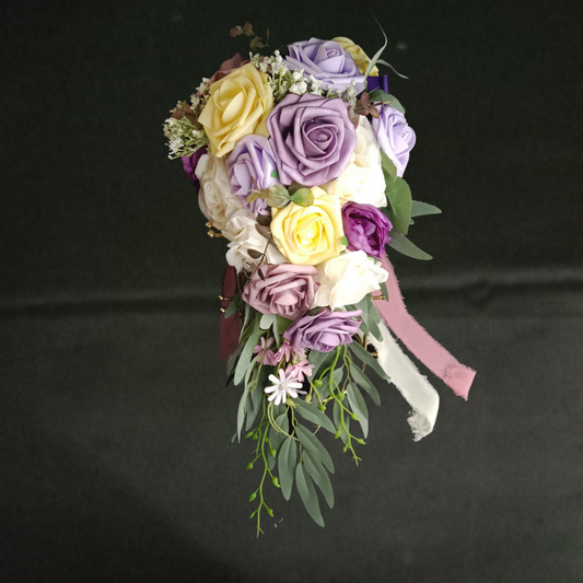 "Rustic burlap-wrapped Rose bridal bouquet"