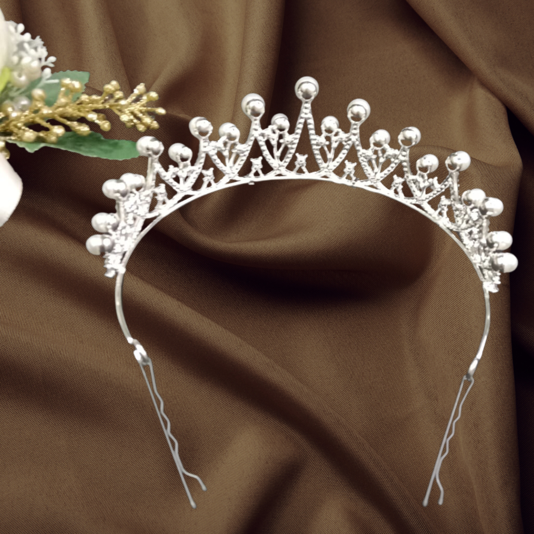 "Pearl-Embellished Tiara – Channel classic elegance with a touch of refinement."