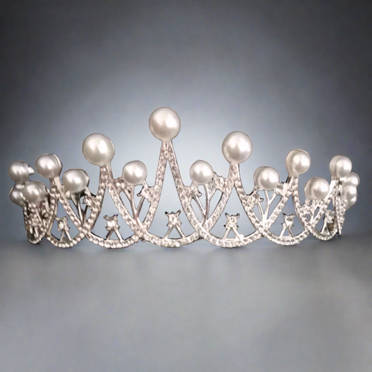 "Celestial White Crown with Moon and Star Accents – Embrace your inner cosmic goddess."