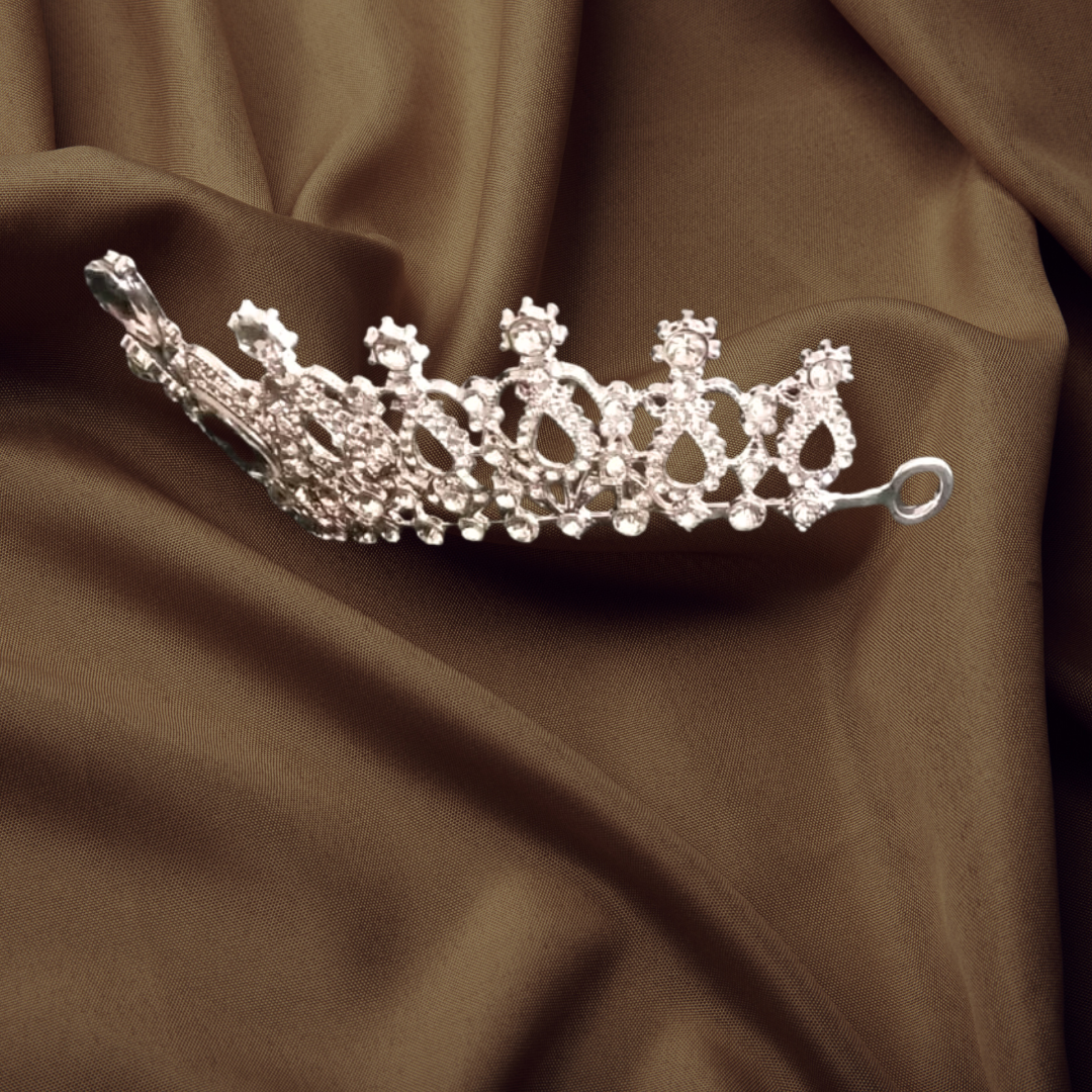 Elegant white Crown with Sparkling Gemstone.