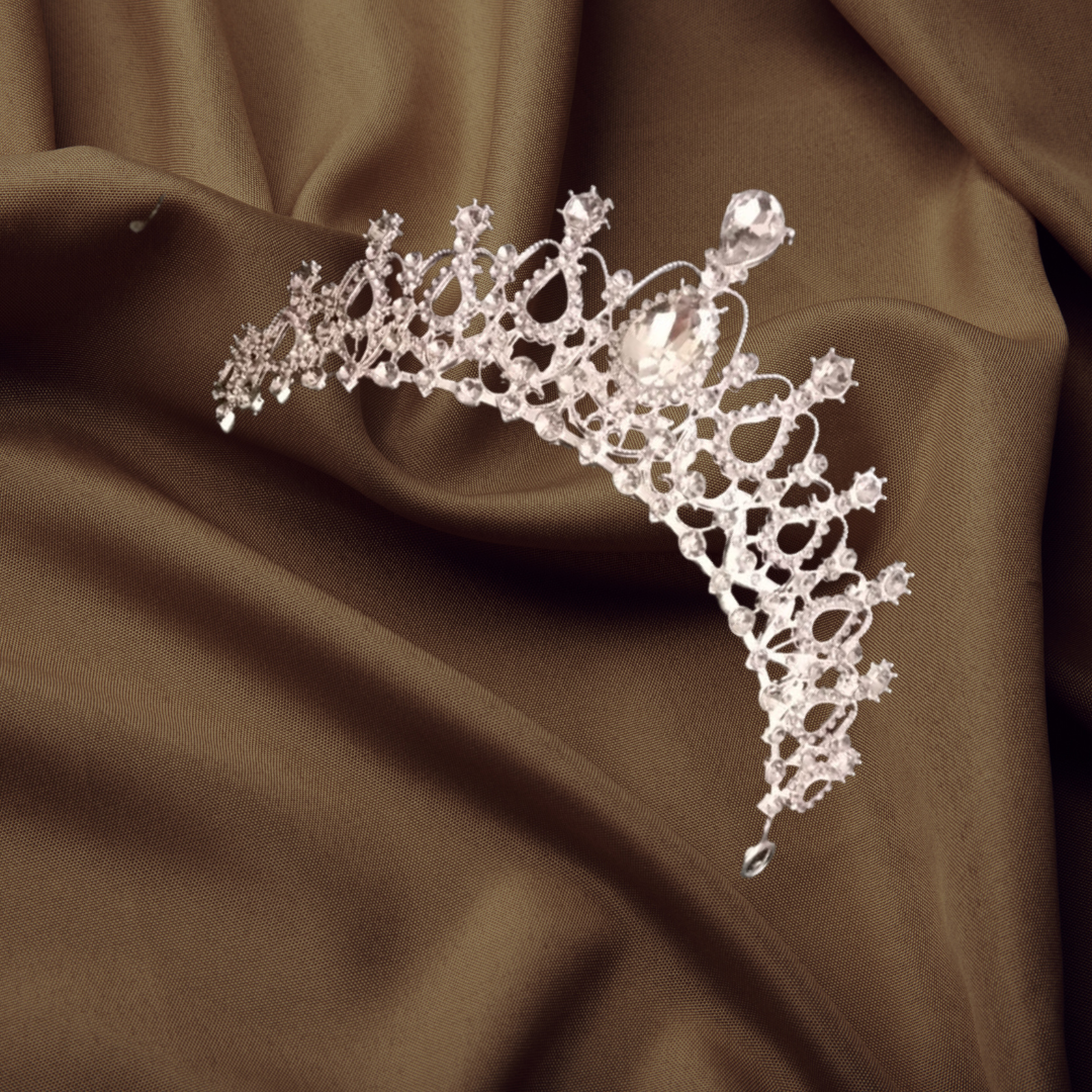 "Intricately Designed Royal White Crown – Crafted with intricate details fit for a queen's ensemble."