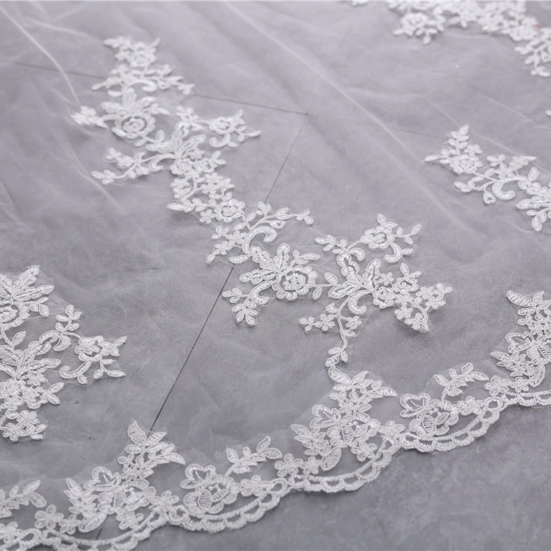 Close-up of lace edge detail on Cathedral Bridal Veil — GownLink GLVHL53