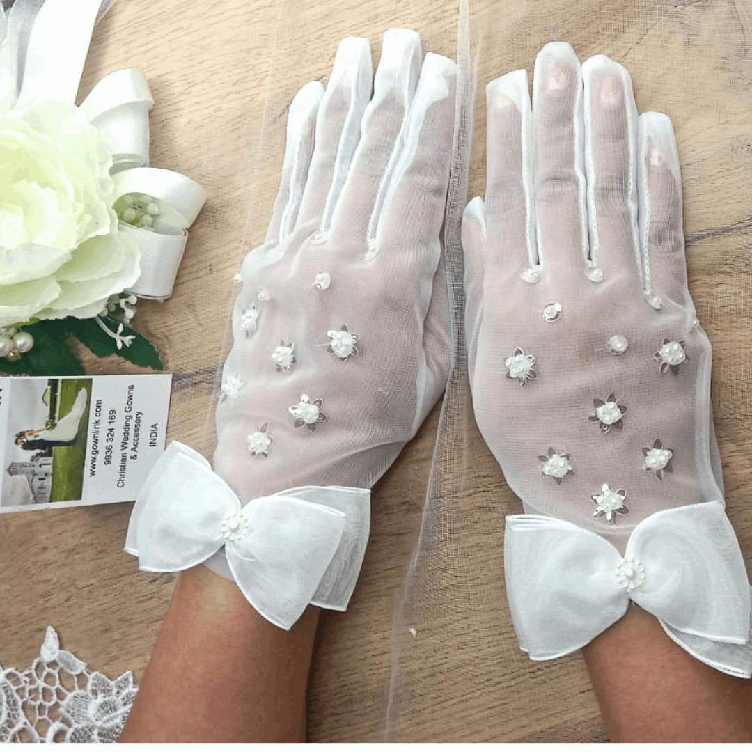 Enchanted Whispers: GownLink's Whimsical Charm Bridal Gloves with Embellished Bow, and Lustrous Pearl Beads G112