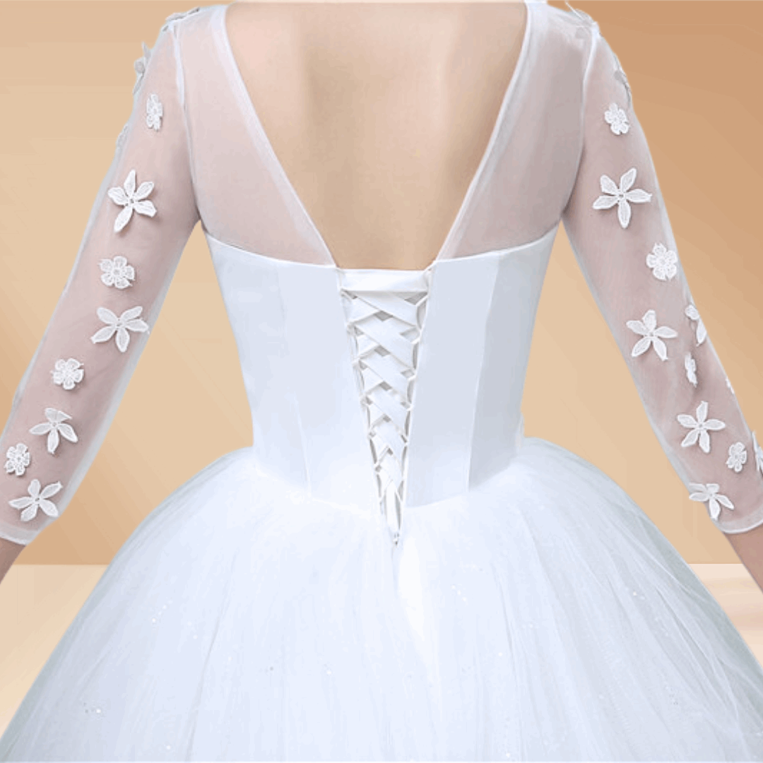 Stunning off-white train gown with intricate details