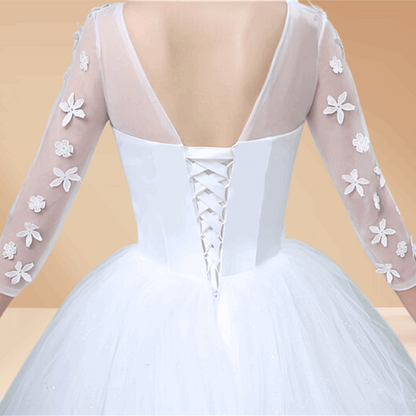 Stunning off-white train gown with intricate details