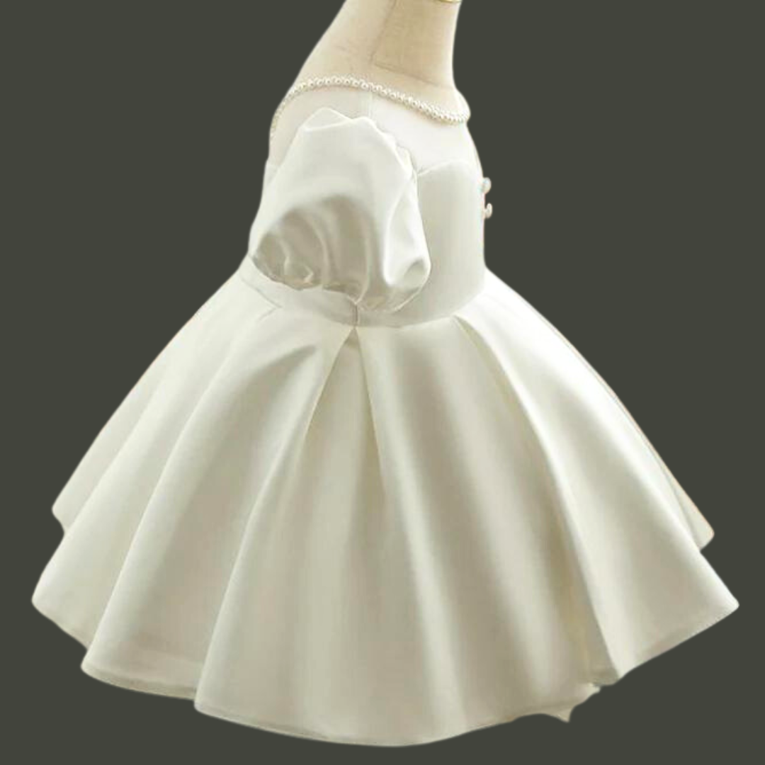 "Gracefully Embrace Devotion in our White Holy Communion Gown"