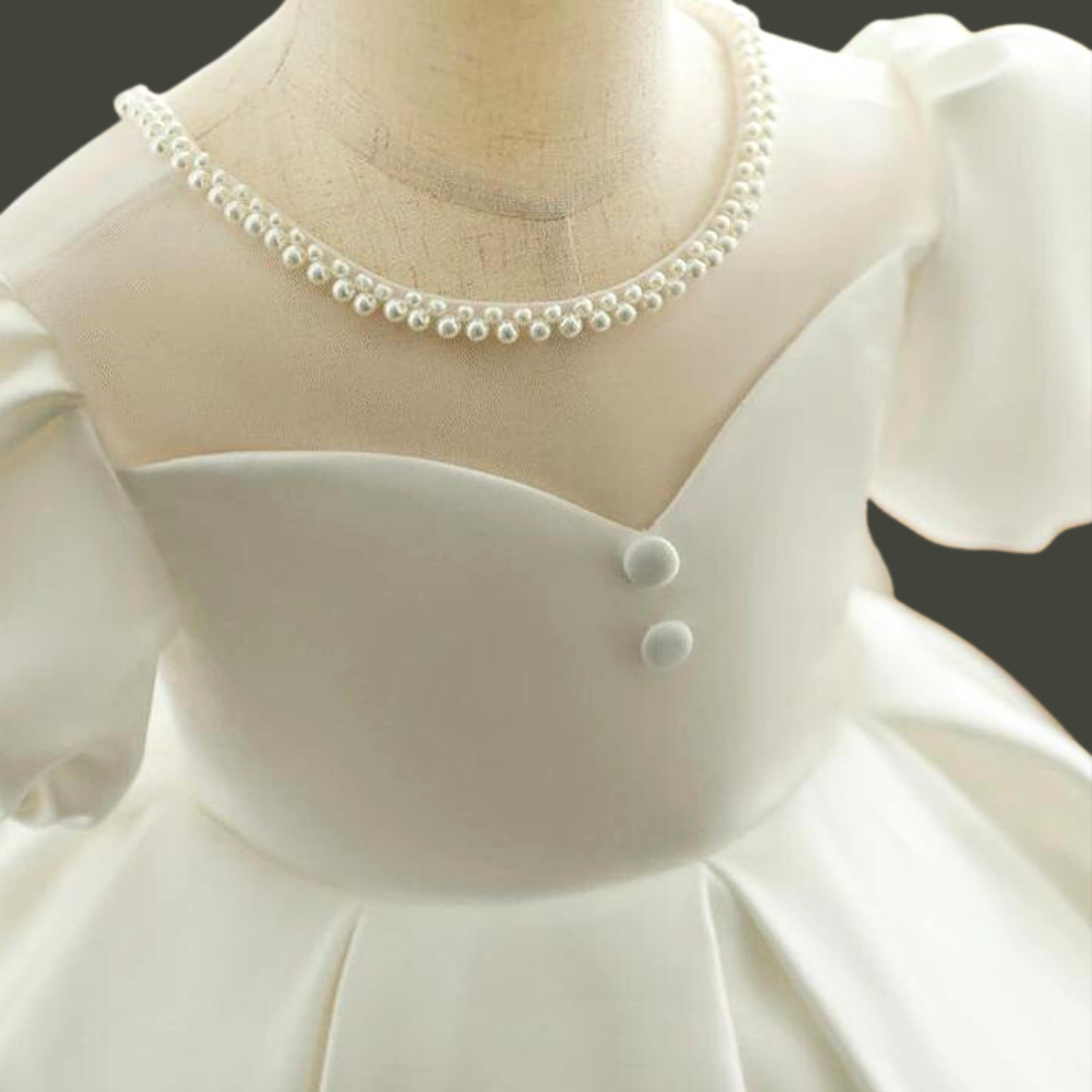 "An Emblem of Purity: Explore our Neck pearl Divine White Communion Dress"