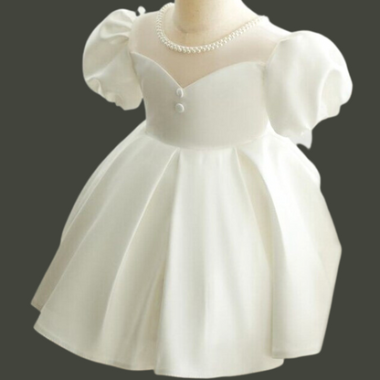 "Crafting Memories: White Holy Communion Gown for a Sacred Day"