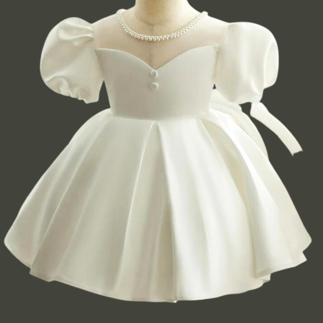 "Journey into Holiness with our Captivating White Holy Communion Dress"