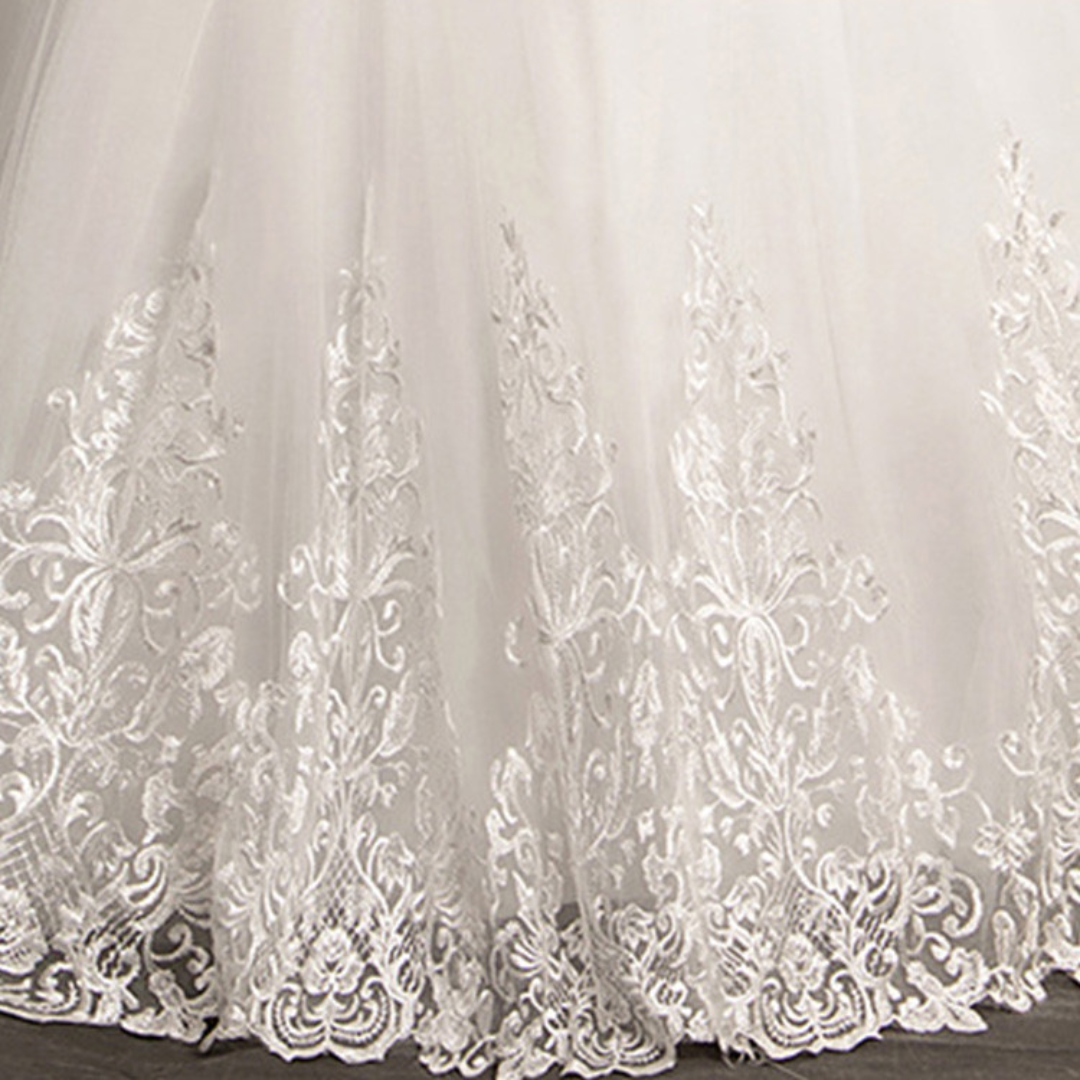 Ethereal tulle White gown for a Catholic wedding ceremony