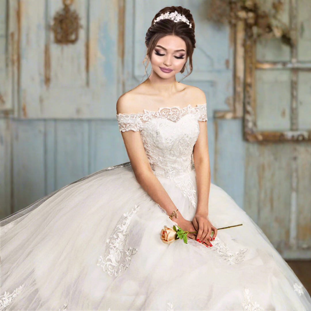 Detail of neckline and bodice on White Bridal Gown with Off Shoulder — GownLink GLQD09