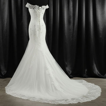 Side profile view of White Mermaid with Royal Train showing silhouette — GownLink GLGT027