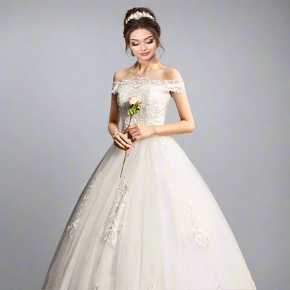 Back view of White Bridal Gown with Off Shoulder showing train and closure detail — GownLink GLQD09