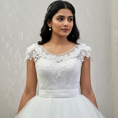Long sleeve white lace wedding dress with soft tulle skirt and delicate embroidery