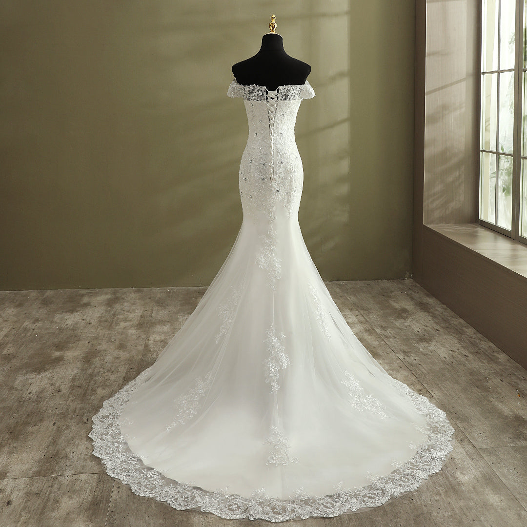 Close-up of lace and fabric detail on White Mermaid with Royal Train — GownLink GLGT027