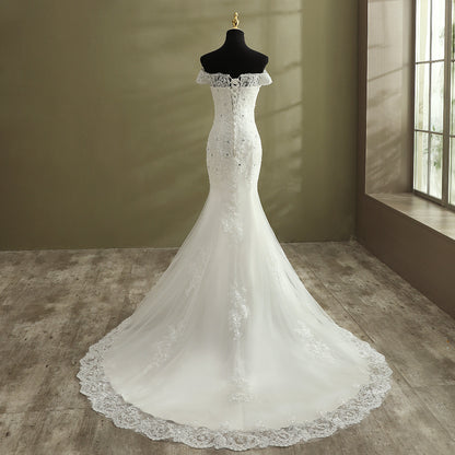 Close-up of lace and fabric detail on White Mermaid with Royal Train — GownLink GLGT027