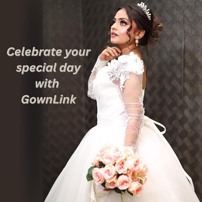 Royal white A-line bridal gown with lace bodice, illusion sleeves, and flowing tulle skirt