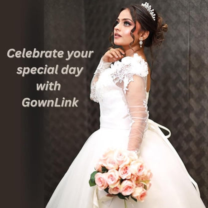 Royal white A-line bridal gown with lace bodice, illusion sleeves, and flowing tulle skirt