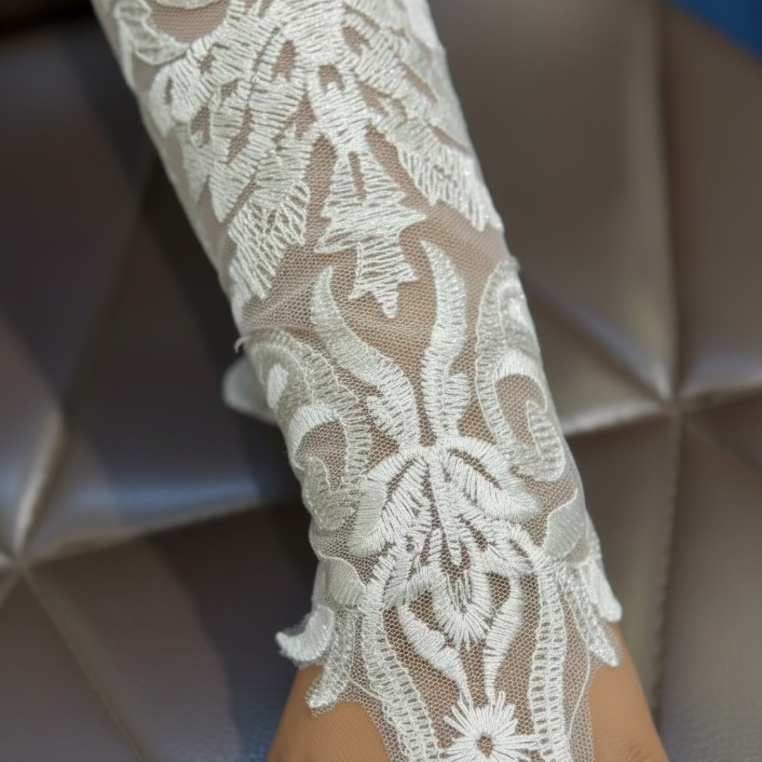 Detail of lace or mesh fabric on Bridal Gloves — GownLink G23