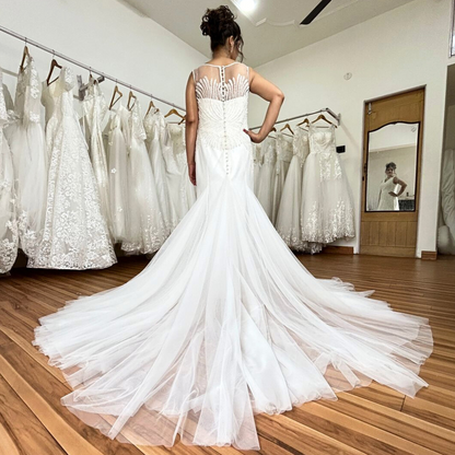 White Catholic ceremonial wedding gown with shine in Goa