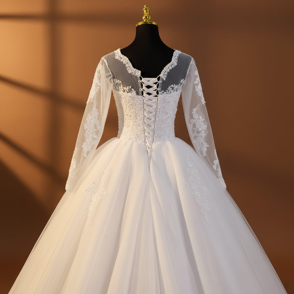 White church wedding dress with lace details in Kolkata