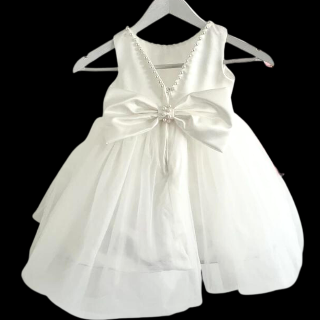 "Step into Elegance and Grace with Bow our White holy Communion Dress"