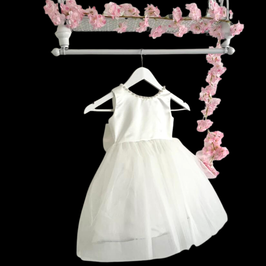 "Crafting Memories: White Holy Communion Gown for a Sacred Journey"