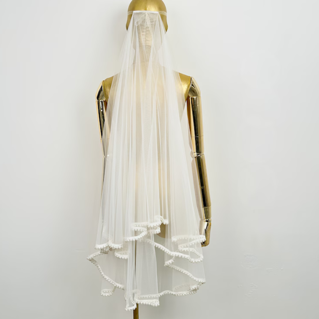 Church setting with model wearing Short Bridal Veil — GownLink GLVL