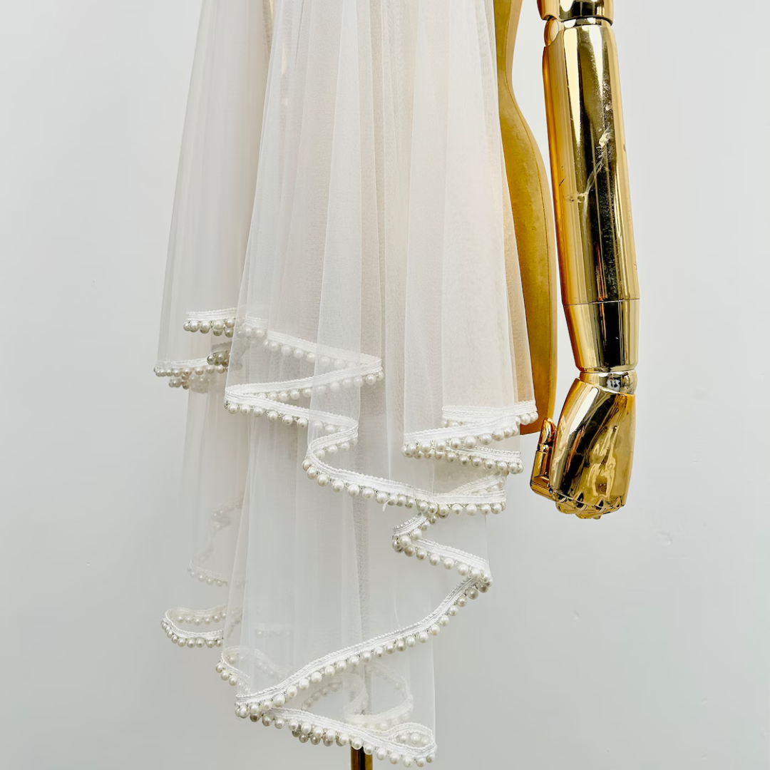Back view of Short Bridal Veil showing full length and drape — GownLink GLVL