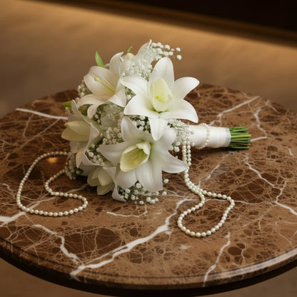 Front view of White Clutch Bridal Bouquet held by bride — GownLink B-138