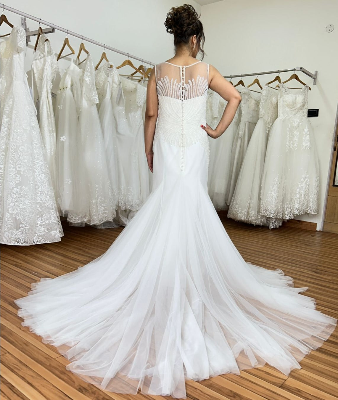 white wedding Dress with Beads Near church