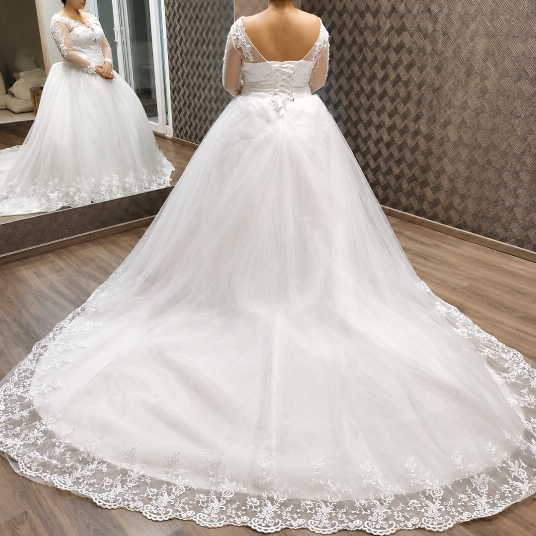 Close-up of lace and fabric detail on White Bridal Gown with Long Train — GownLink GLHSD189T