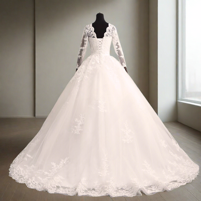 Classic Christian church wedding gown with floral lace embroidery and a flowing silhouette
