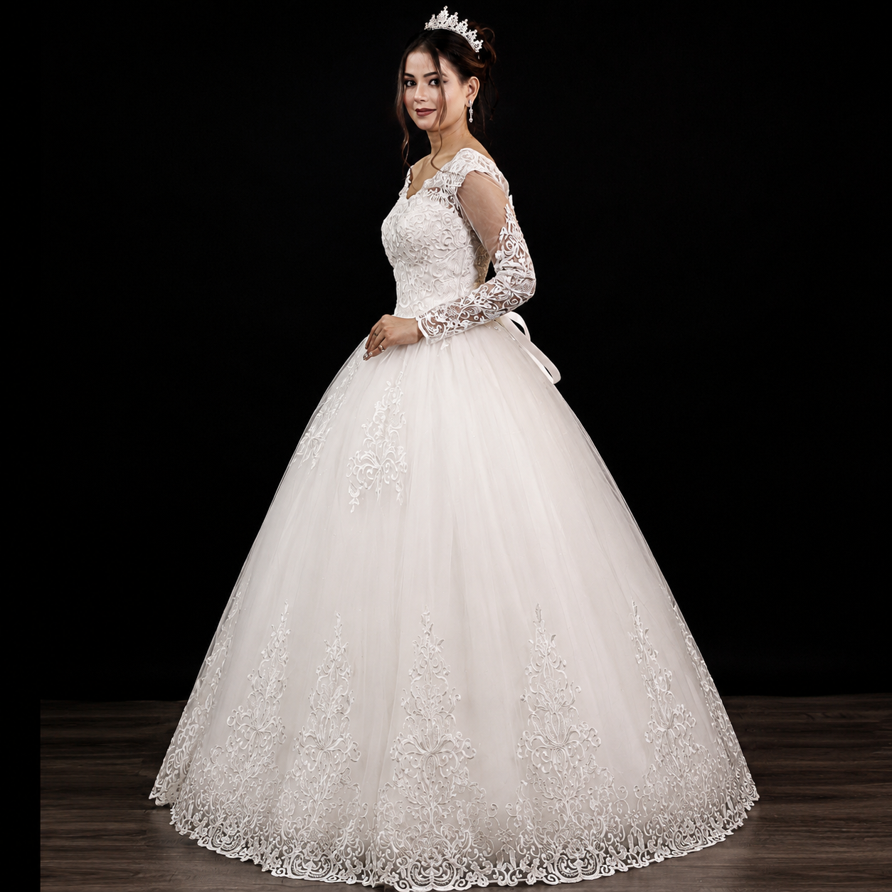 Christian wedding dress with long lace sleeves, illusion neckline, and elegant floral embroidery